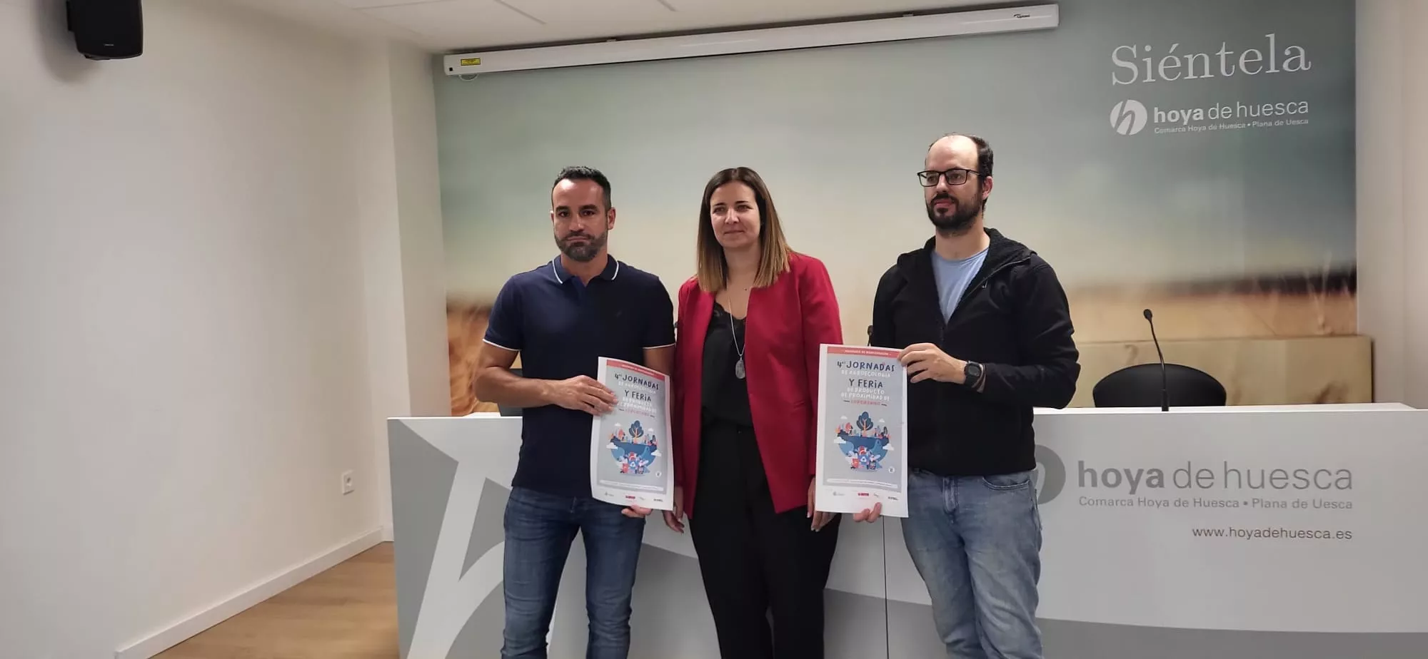 David Suelves, Mónica Soler y Jorge Luis Bail han presentado las jornadas y feria de productos de proximidad.