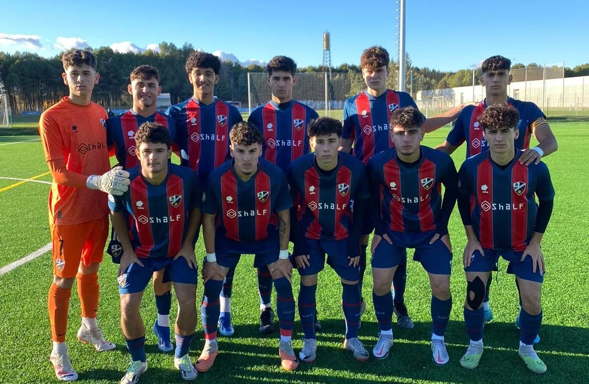 Once del Huesca DHJ en un partido de esta temporada en la Base.