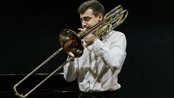 Juan Paúl Muñoz se quedó hechizado desde niño por el trombón.