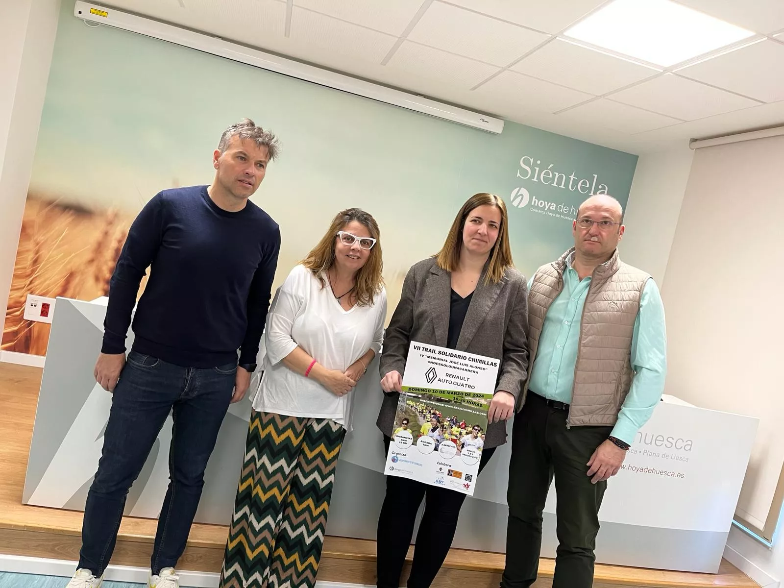 Ramón Mur, Mónica Sarasa, Mónica Soler y Miguel Torres, en la presentación de la Trail Solidario de Chimillas. Foto: A. Mora