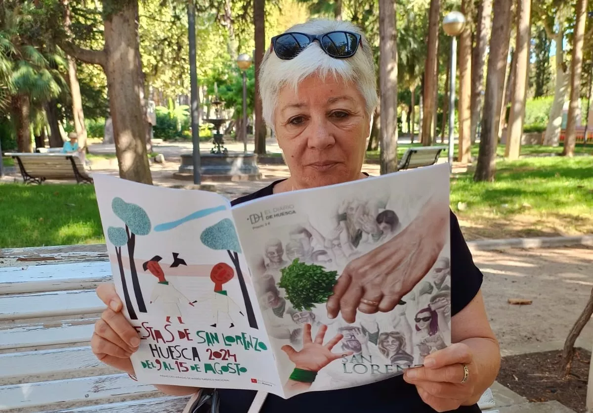 Nuestros lectores con la revista de San Lorenzo de EL DIARIO DE HUESCA.