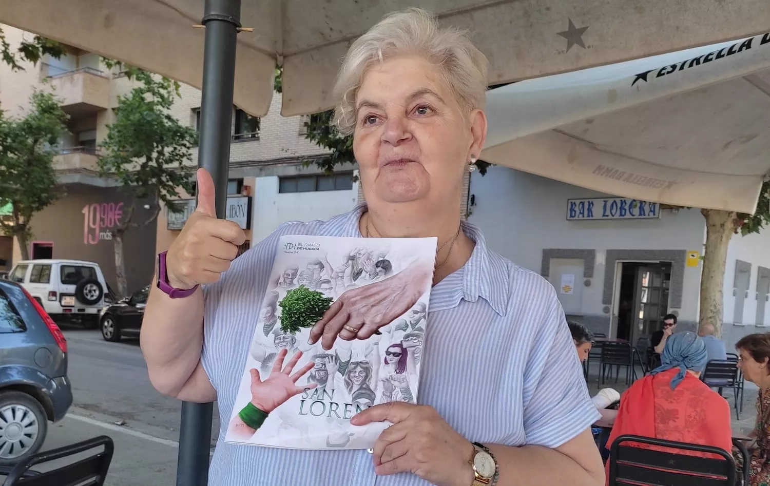 Nuestros lectores con la revista de San Lorenzo de EL DIARIO DE HUESCA.