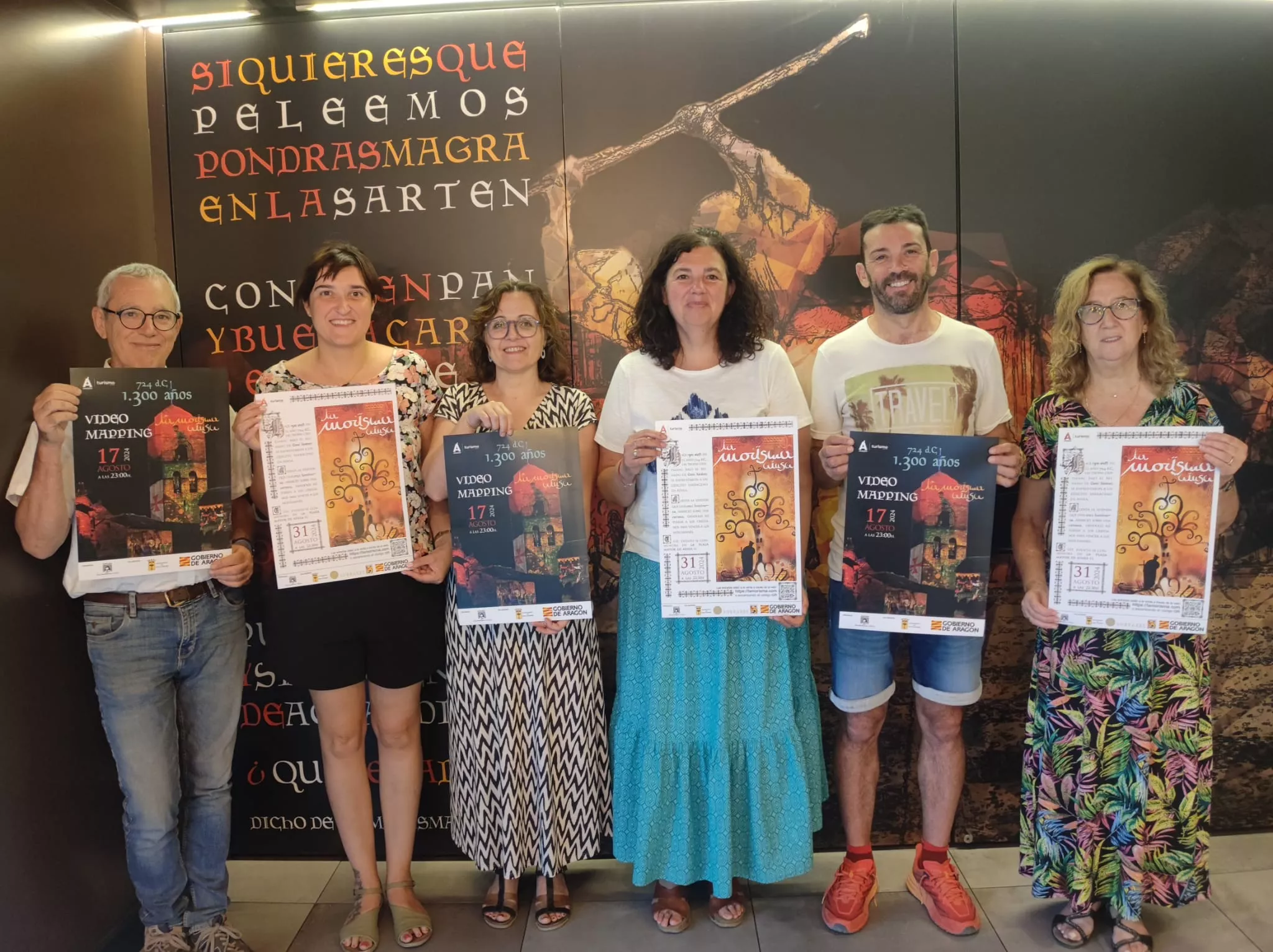 Isabel Bergua y Enrique Pueyo junto a miembros de la organización de La Morisma. Isabel Bergua y Enrique Pueyo junto a miembros de la organización de La Morisma.