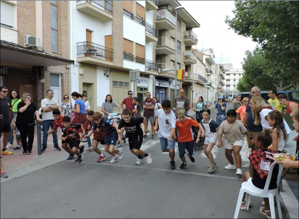 Salida de la carrera de niños y niñas de 10 y 11 años