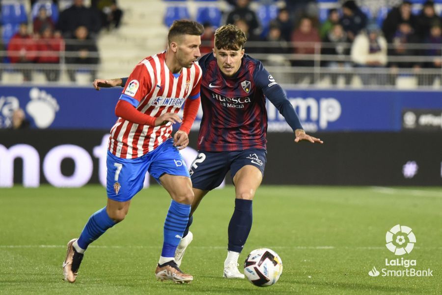Imágenes del partido entre el Huesca y el Sporting. Foto La Liga