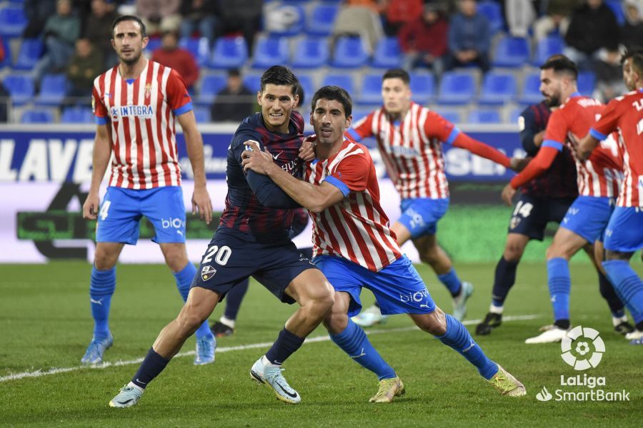 Imágenes del partido entre el Huesca y el Sporting. Foto La Liga