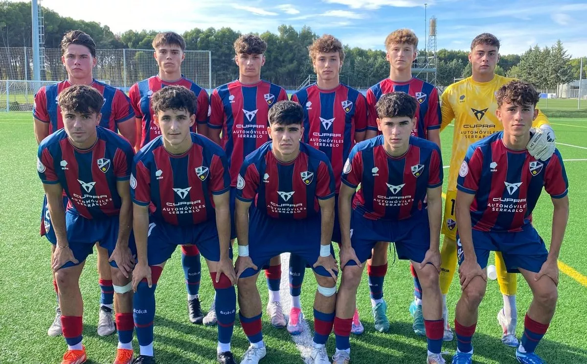 Once del Huesca ante el Badalona.