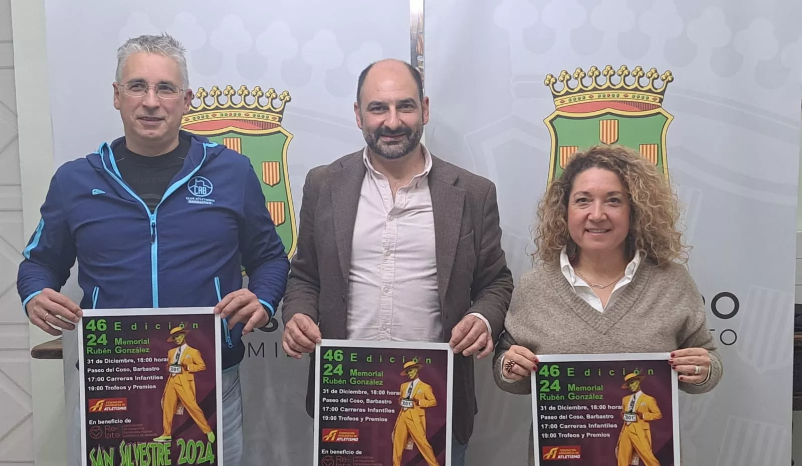 Lacoma, Torres y Cortés, en la presentación de la San Silvestre de Barbastro.