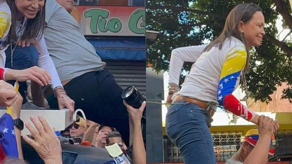 Corina Machado guardando la estampa en su tejano. Foto Jóvenes Católicos en X