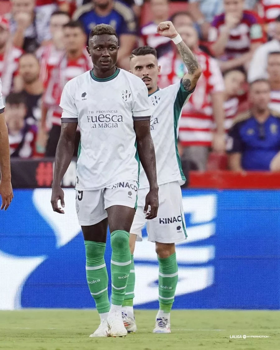 Soko y Joaquín celebran un gol en la ida en Los Cármenes de Granada