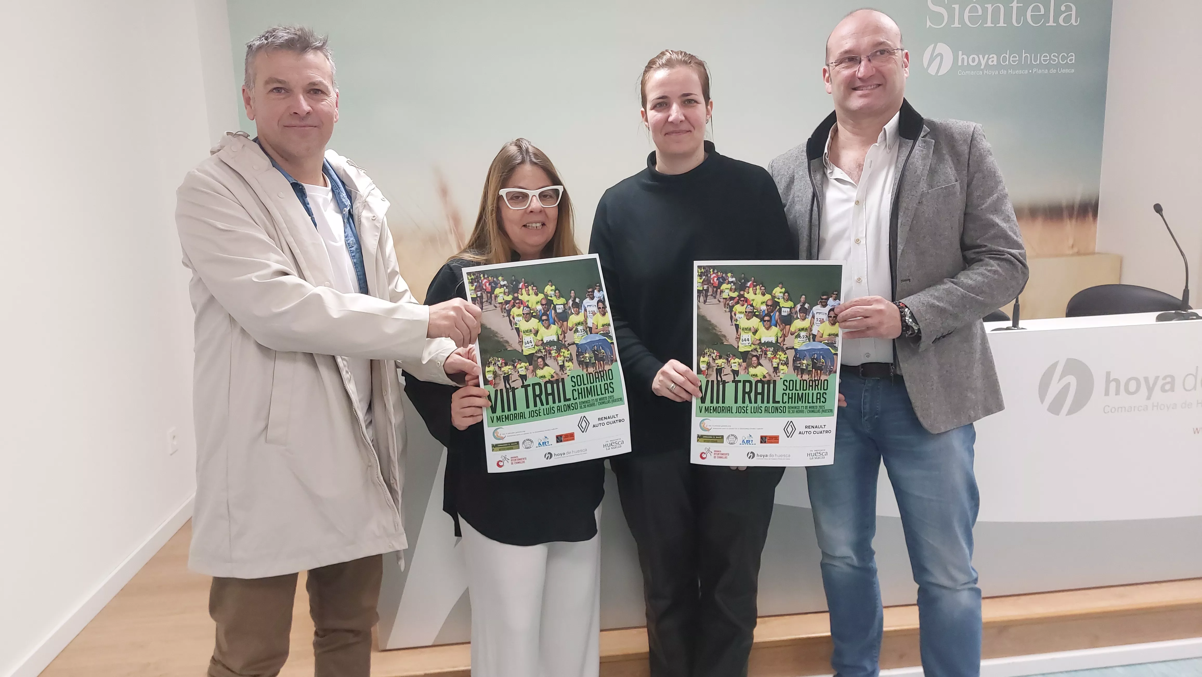Ramón Mur, Mónica Sarasa, Mónica Soler y Miguel Ángel Torres, en la presentación del Trail Solidario de Chimillas
