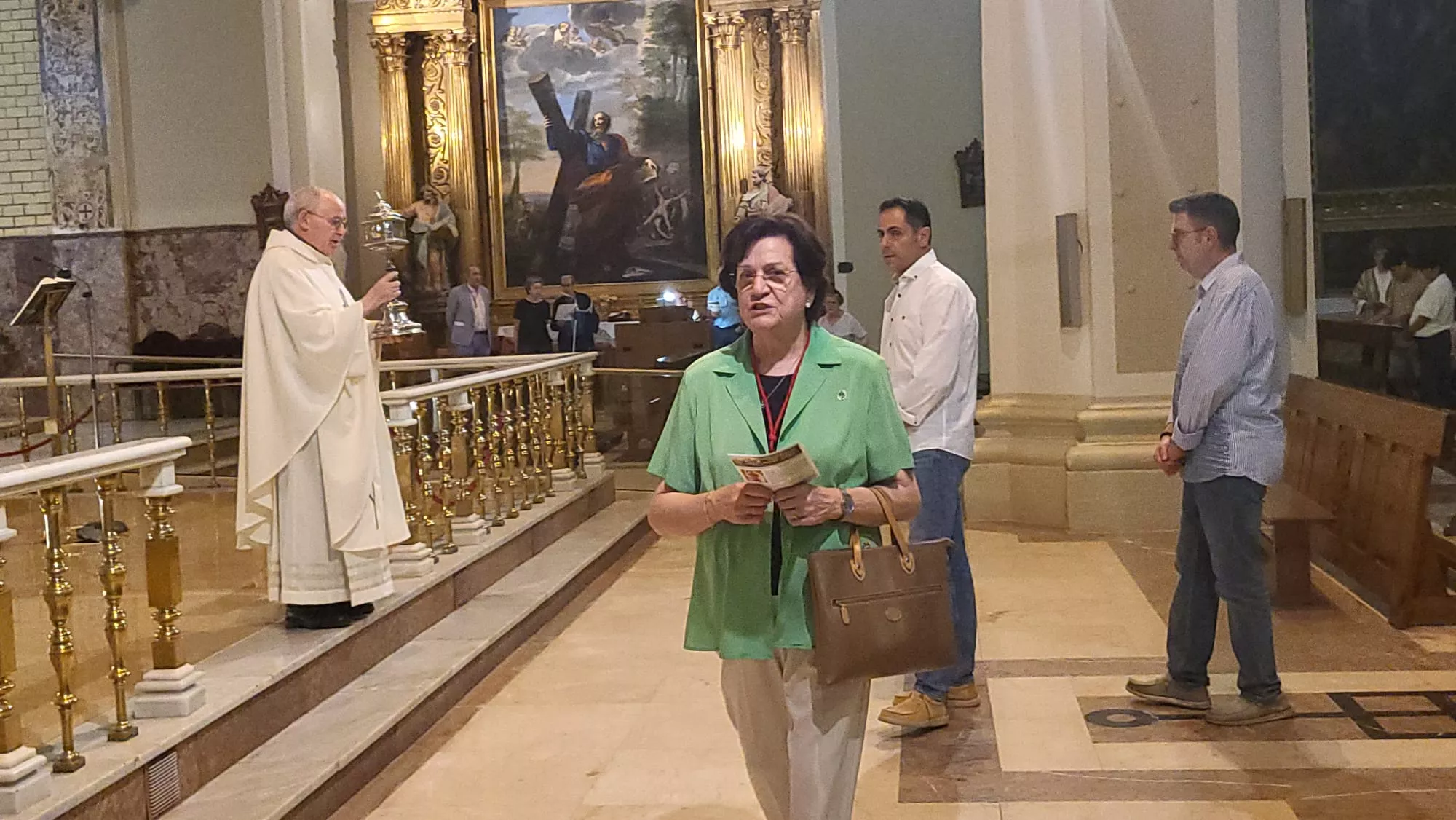 Veneración de San Lorenzo en la Basílica donde se han estrenado los gallardetes