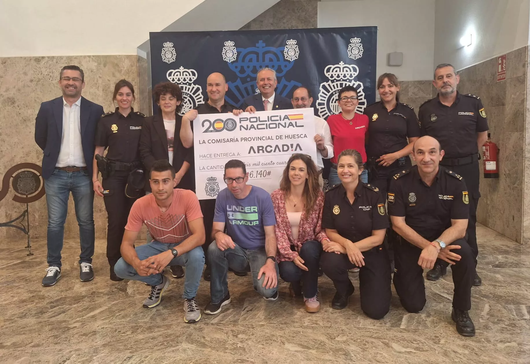 La Policía Nacional de Huesca entrega a Arcadia la recaudación de la carrera solidaria Ruta 091.