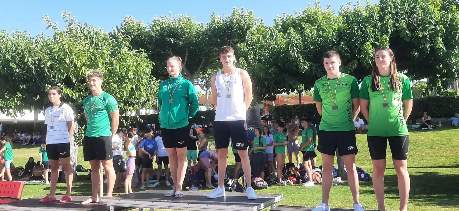 Podio absoluto de 200 libre masculino y 100 libre femeninio