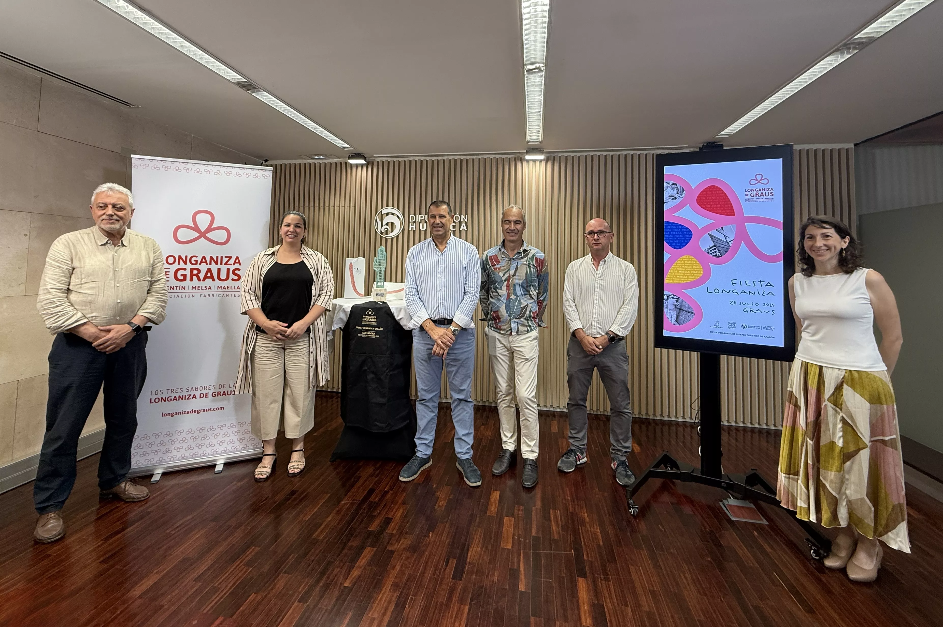 Representantes de la Asociación de Longaniza de Graus, Diputación Provincial y Ayuntamiento grausino Representantes de la Asociación de Longaniza de Graus, Diputación Provincial y Ayuntamiento grausino