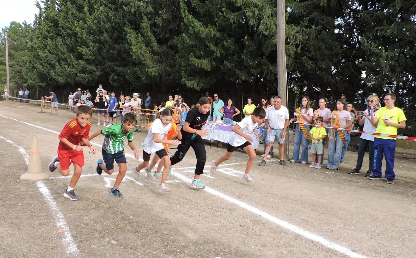9 Salida de la carrera de niños y niñas de 10 a 12 años