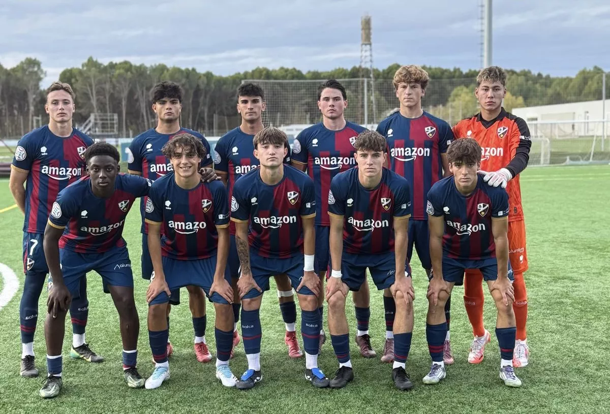 Once del Huesca ante el Girona.