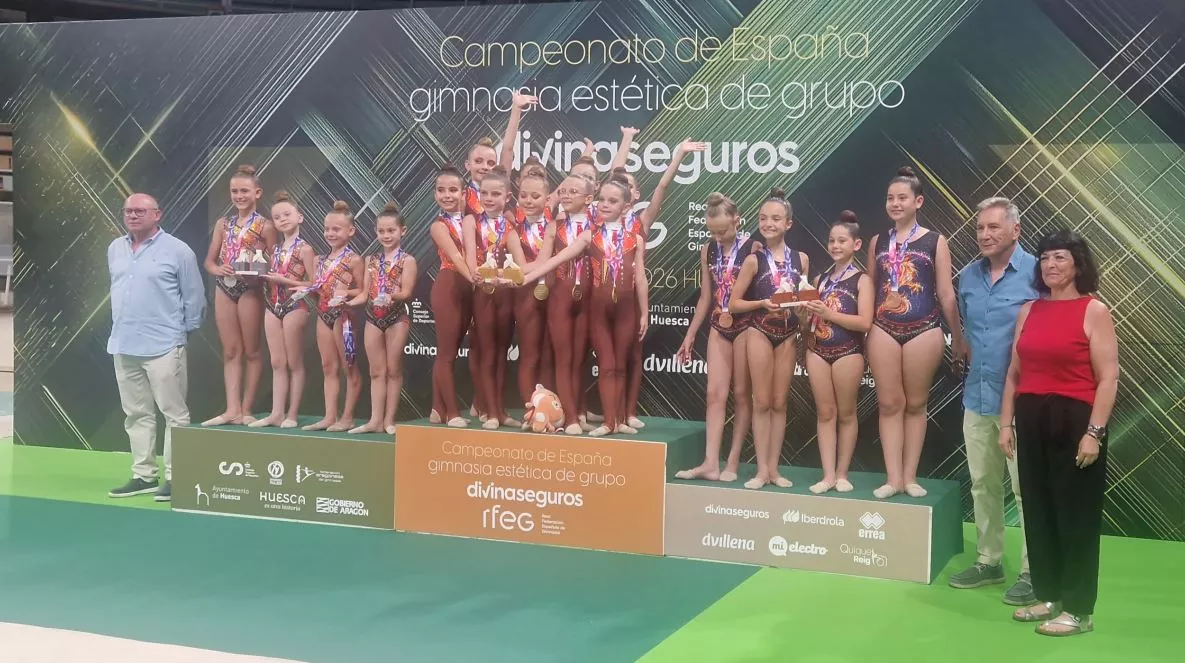Podio Infantil 8-10 programa corto, con el Cuarte campeón.