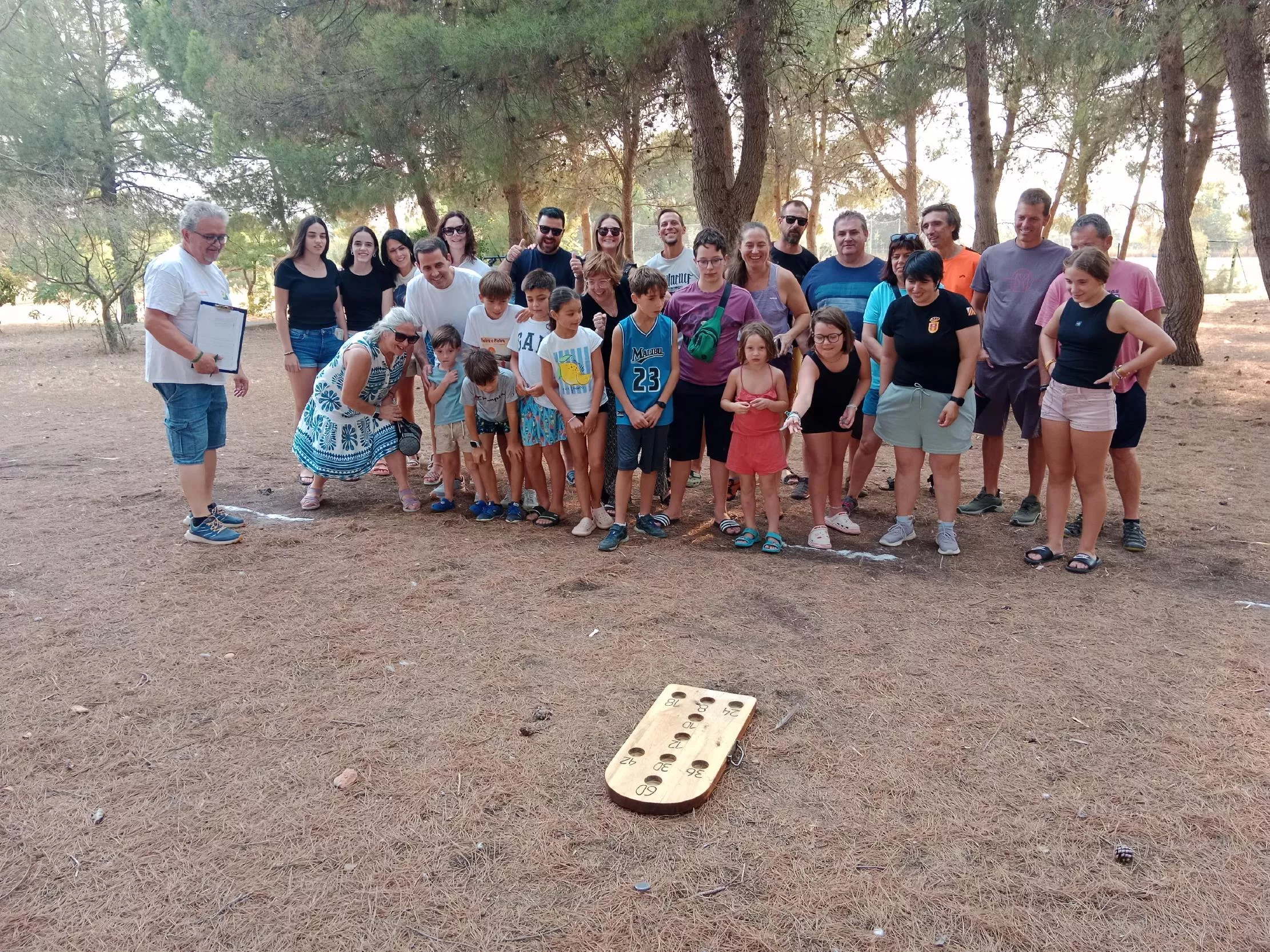 Juegos tradicionales en Quicena, hoyetes, diario de Huesca