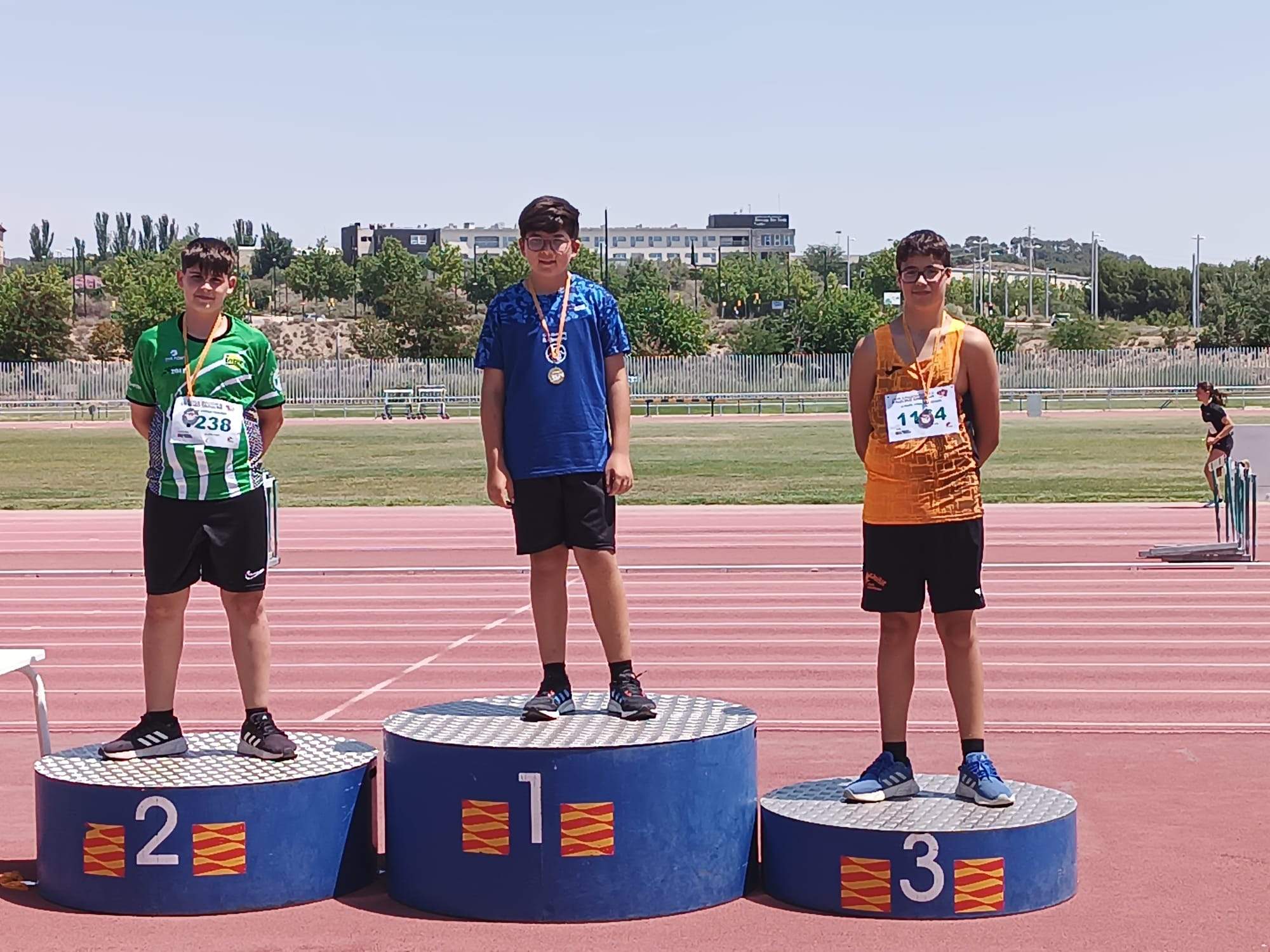 Podio de martillo con Jorge Ayerbe y Gonzalo Alonso.