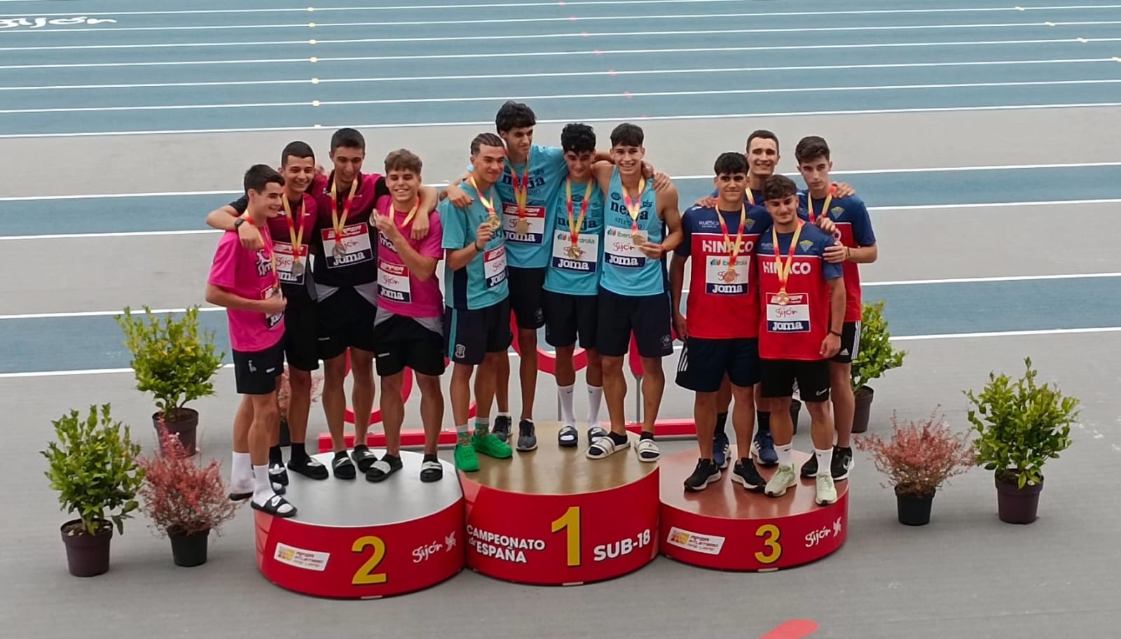 Podio final del relevo 4x100